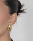 Heaven Mayhem bean gold earrings